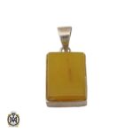 مدال عقیق زرد با حکاکی شرف الشمس طرح اسپرت - کد 3269