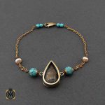 دستبند فیروزه نیشابوری مروارید پرورشی زنانه طرح آیدا دستبند فیروزه نیشابوری مروارید پرورشی زنانه طرح آیدا