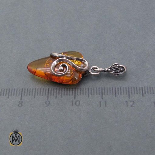 مدال اصل کهربا قهوه ای بولونی شفاف